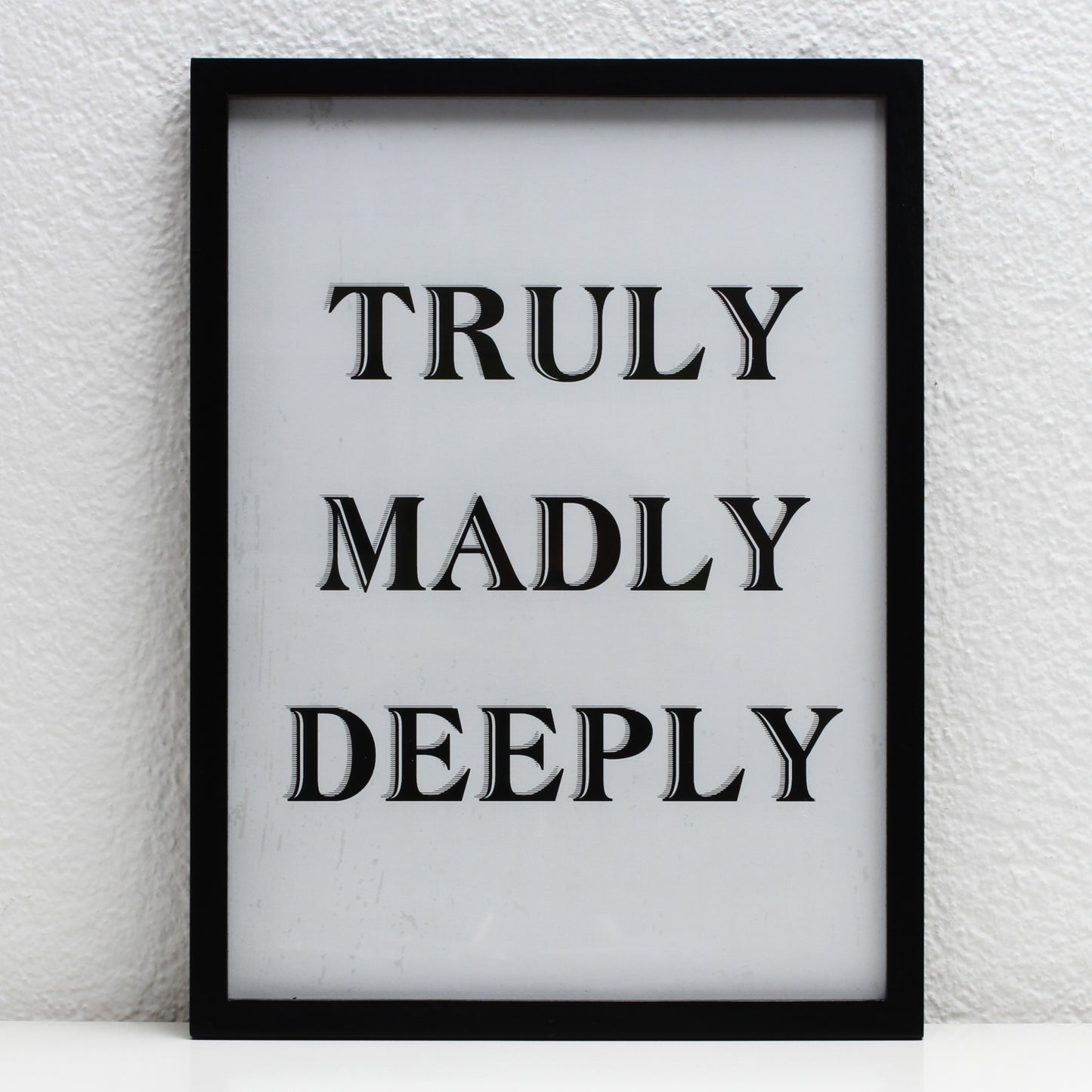 Bild mit Rahmen: Truly, madly, deeply