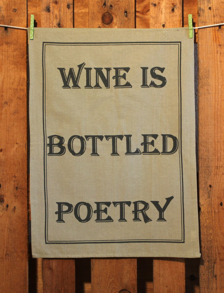 Küchentuch: Wine is bottled poetry