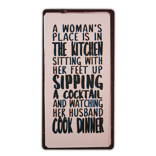 Magnet: A woman's place is in the kitchen sitting with her feet up sipping a cocktail and watching her husband cook dinner
